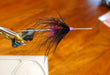 Pan Handler Hobo Spey fly tied on Aqua Flies tube with lavender conehead, black marabou, and red guinea — steelhead spey fly pattern by Red’s Fly Shop