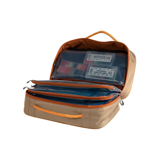 Tailwater Fly Tying Kit by Fishpond featuring organized compartments, durable fabric, and tool storage for fly tying at home or on the go.