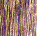 Strands of holographic flashabou in sunset color, featuring iridescent tones ideal for flashy streamers, baitfish patterns, and saltwater flies.