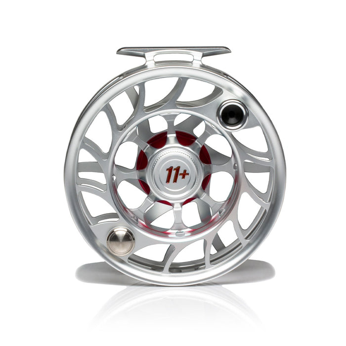 https://redsflyfishing.com/cdn/shop/products/Iconic11PlusReel_ClearRed_LargeArbor_Back_700x700.jpg?v=1640294407